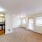 bright apartment living room and dining area next to kitchen