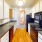 galley style kitchen with ample lighting