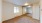 carpeted bedroom with mirrored closed doors